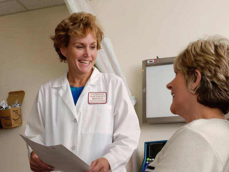 A clinician works one-on-one with an older patient during a home therapy session