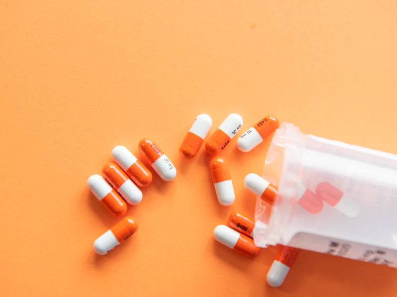 Prescription medications gathered for a nurse's medication reconciliation visit