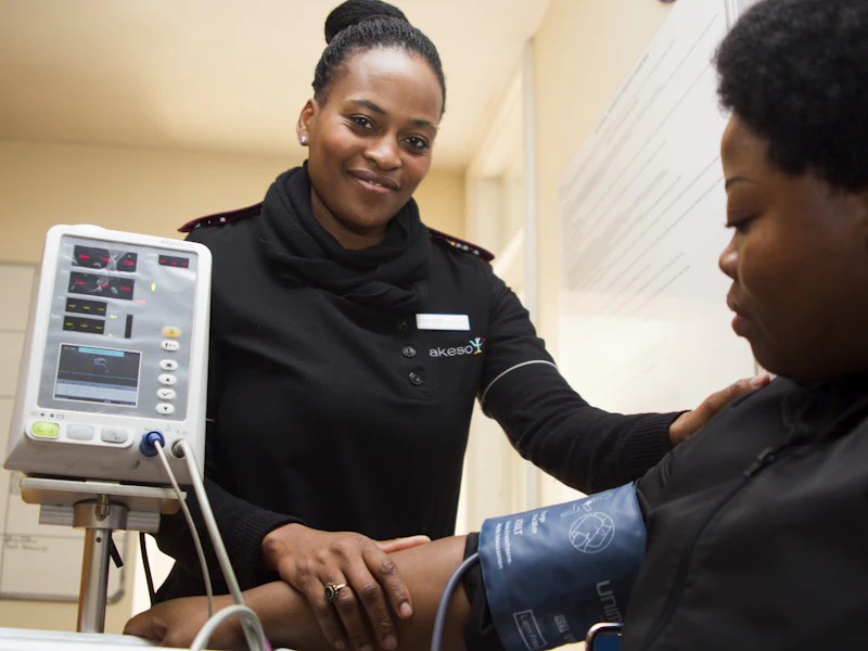 A home health nurse checks her patient's blood pressure during a skilled nursing visit in Las Vegas